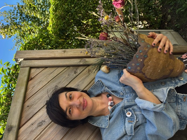 Ana working with ceramics